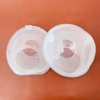 Deux coquilles d'allaitement Dodoshi