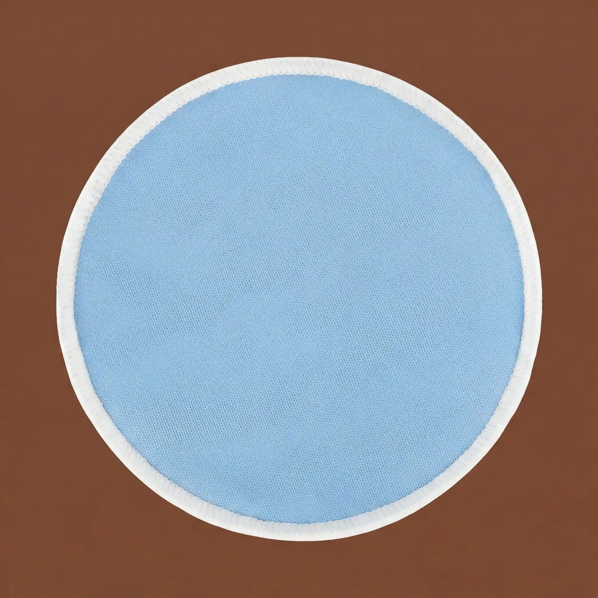 Un des coussinets d'allaitement bleu Tenous