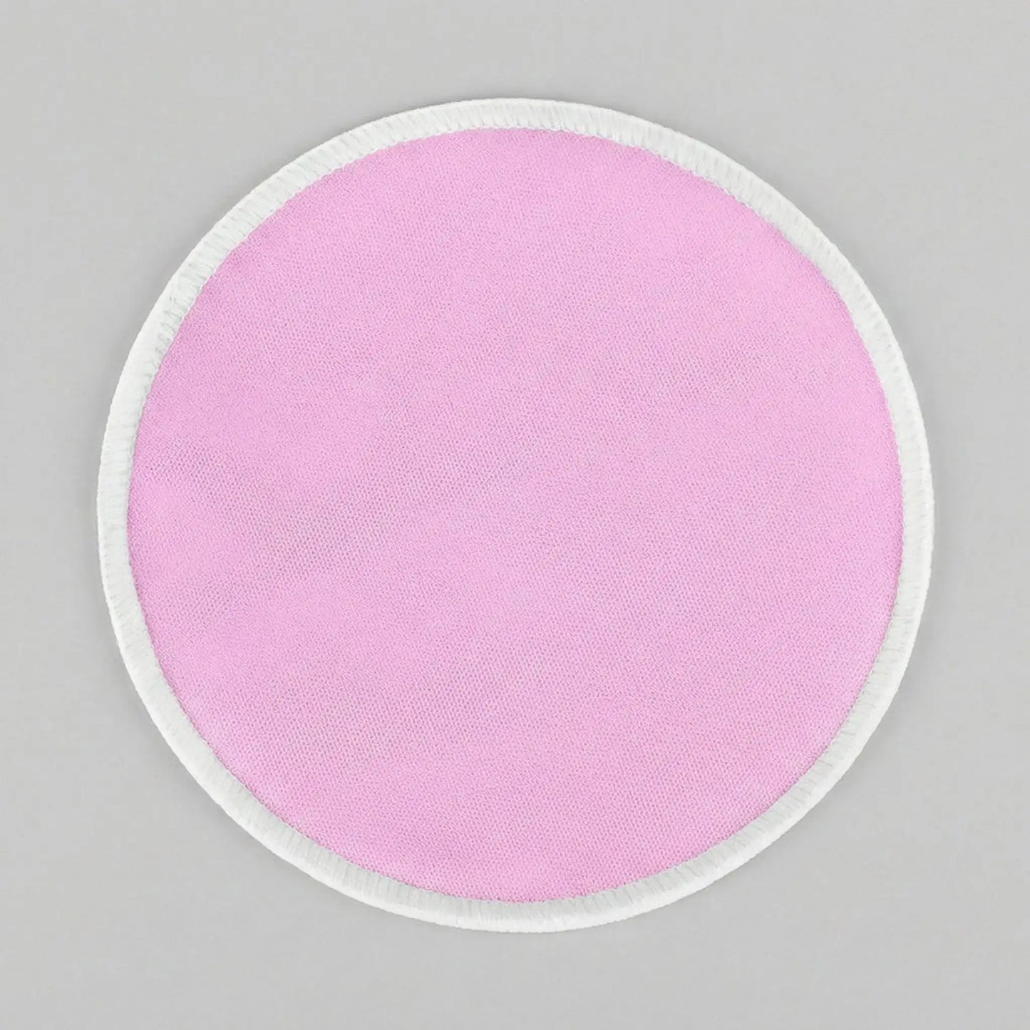 Un des coussinets d'allaitement rose Tenous