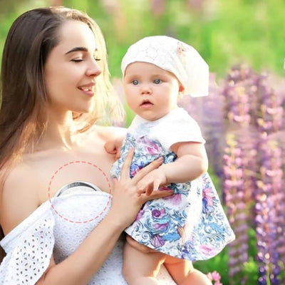 tire lait vitalait bebe bras maman